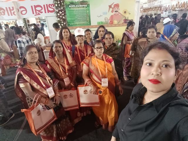 With women farmers at the agriculture fair