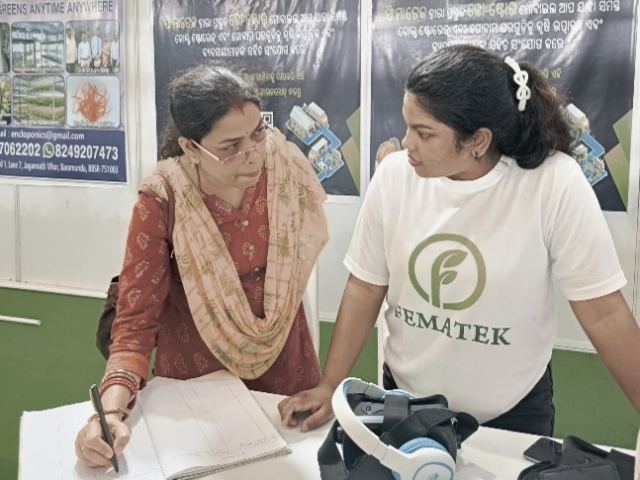Visitors signing up at our stall